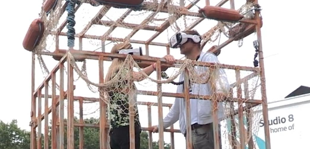 Toby and Pippa in the shark cage diving simulator 